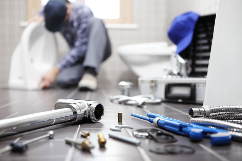 Plumbing inspection being performed on a toilet in Wilmington, North Carolina.